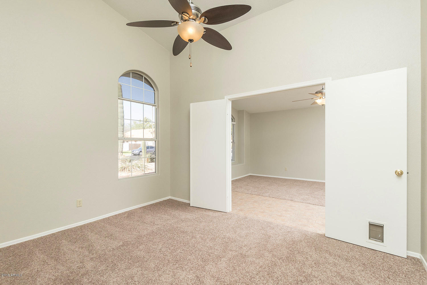 425 West Smoke Tree Road Gilbert, AZ 85233 - Photo 5 of 18 a view of an empty room with a window