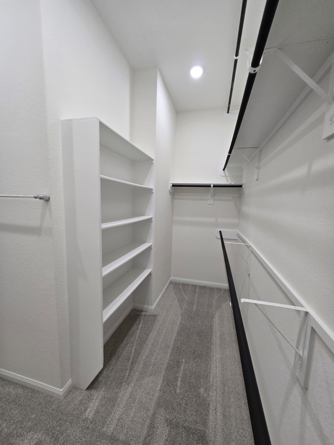 1420 Florecer Lane Magnolia, TX 77354 - Photo 18 of 36 a view of an empty walk in closet