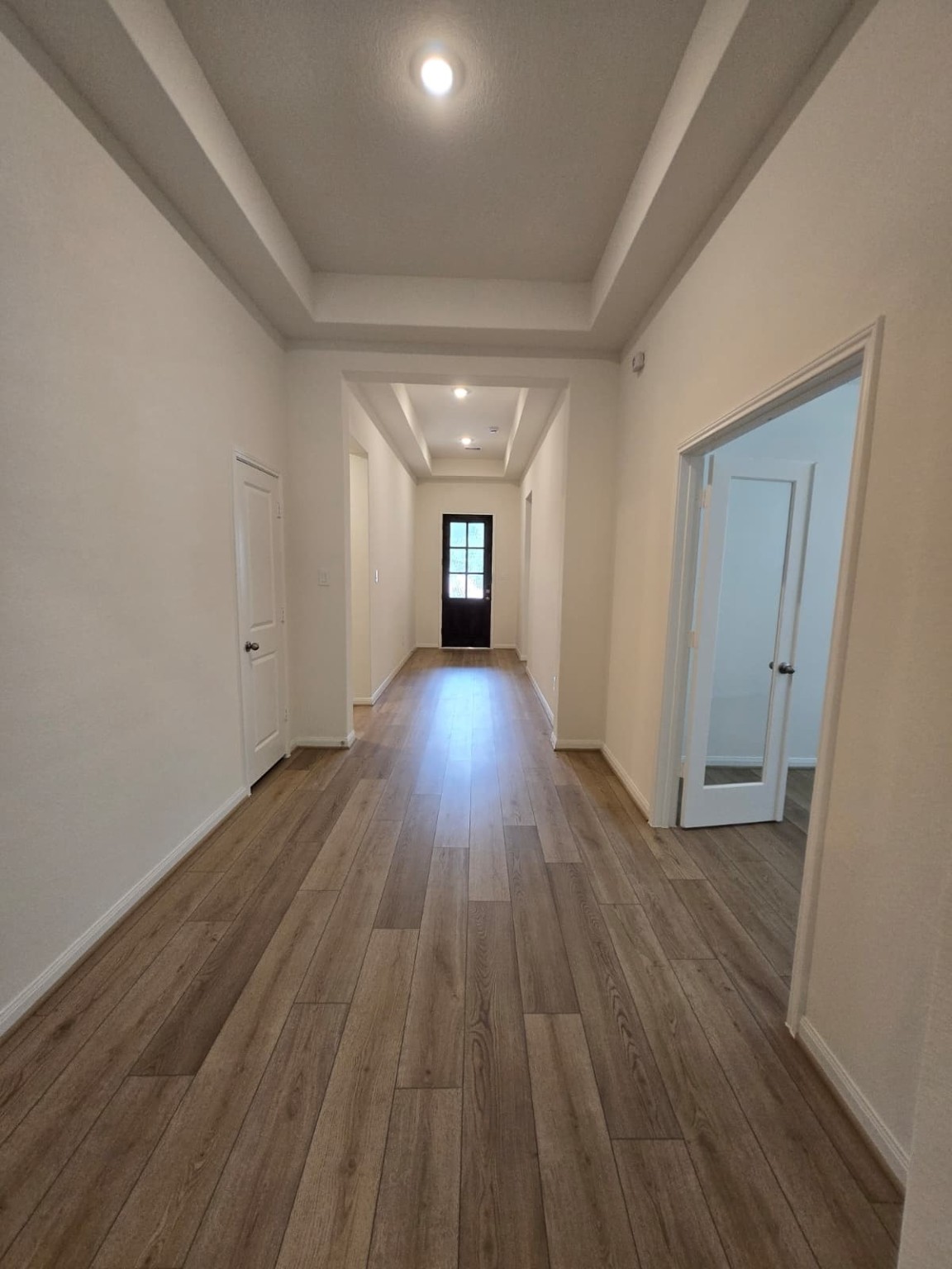 1420 Florecer Lane Magnolia, TX 77354 - Photo 19 of 36 wooden floor in an empty room with a window