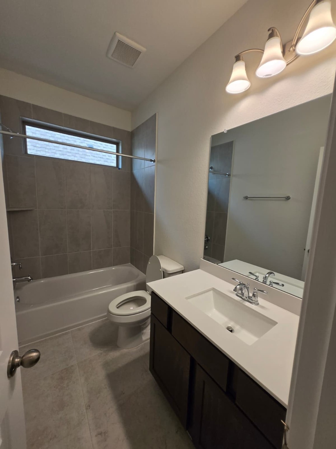 1420 Florecer Lane Magnolia, TX 77354 - Photo 24 of 36 a bathroom with a sink a toilet and shower