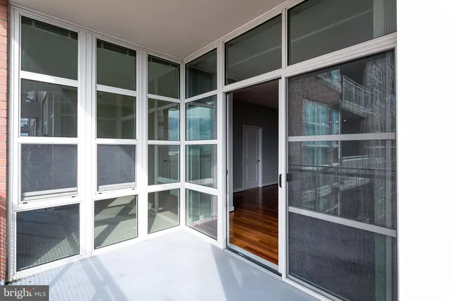 a view of a balcony with city view