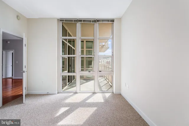 an empty room with windows