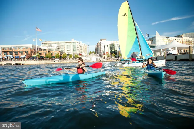 a group of bicycles parked next to a building