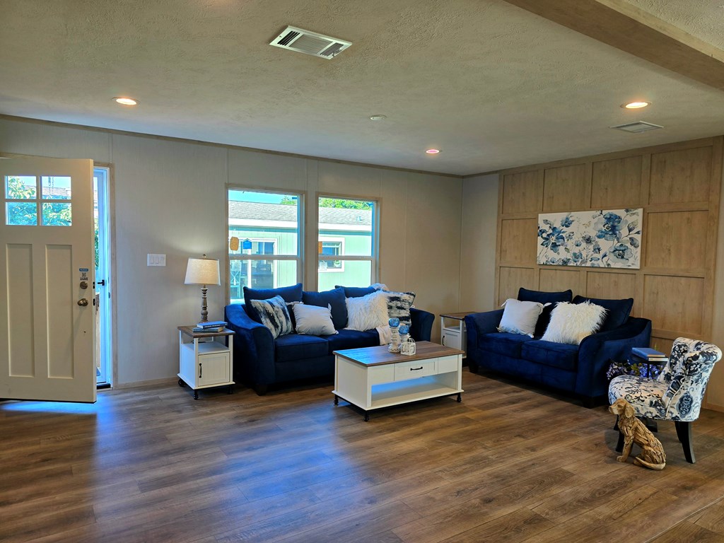 110 Deer Ridge Mason, TX 76856 - Photo 2 of 8 a living room with furniture and a wooden floor