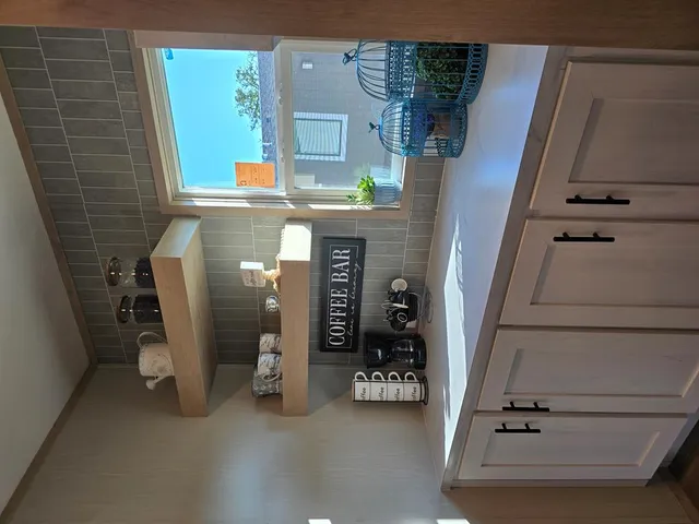 view of hall way with furniture