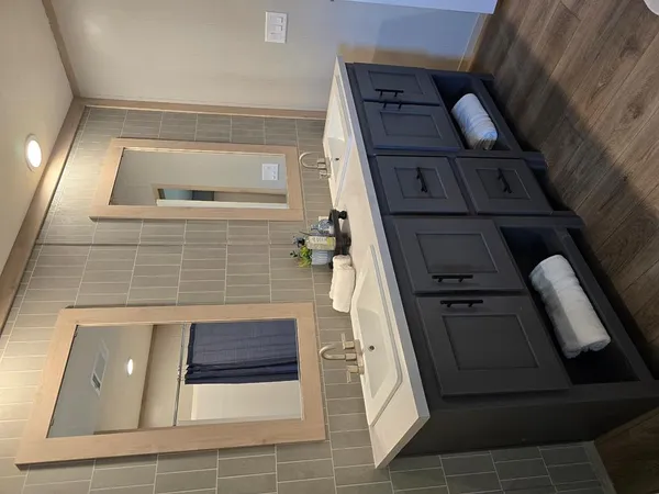 a front view of a house with large windows