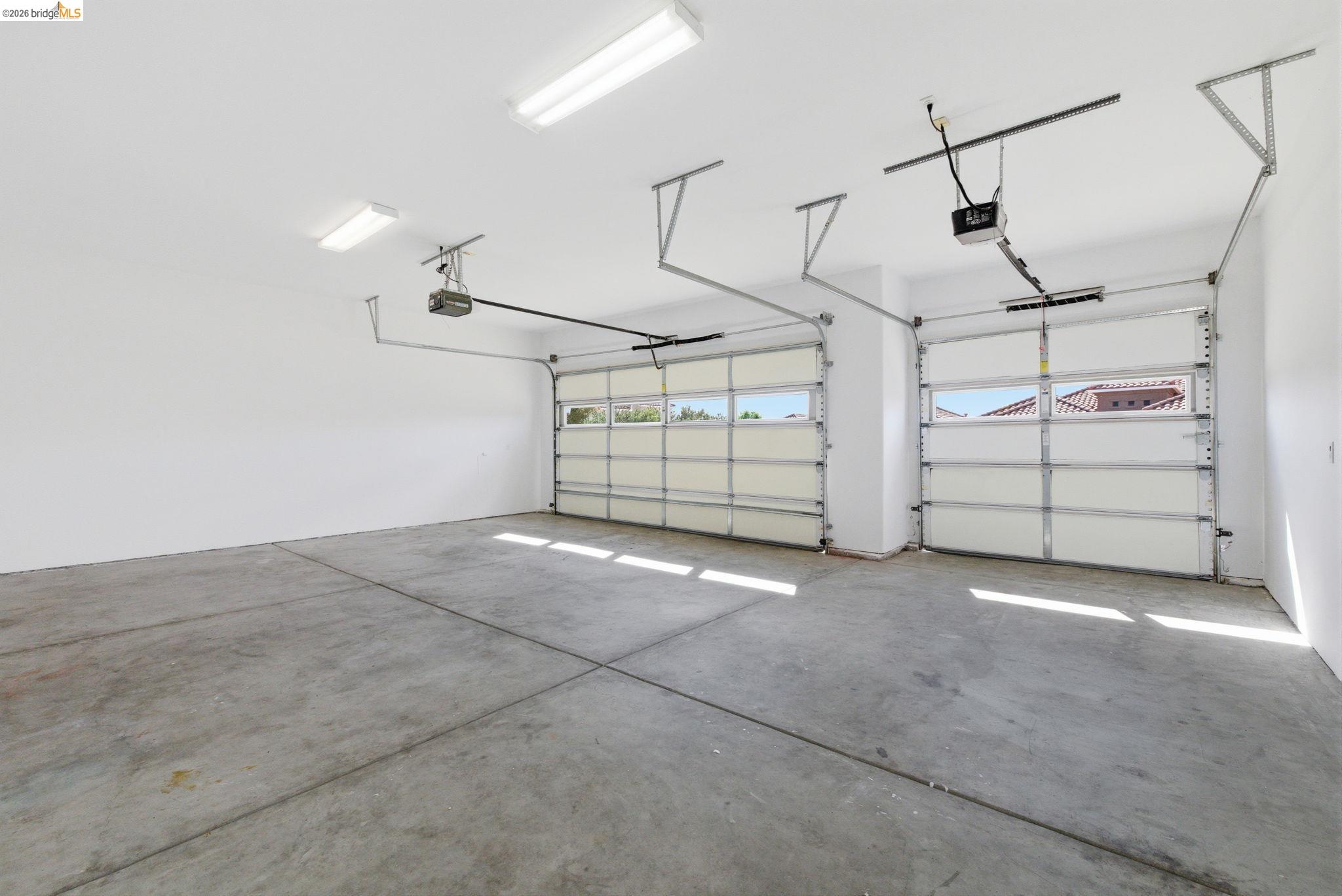 32 Apollo Lane Copperopolis, CA 95228 - Photo 21 of 58 Garage featuring a garage door opener