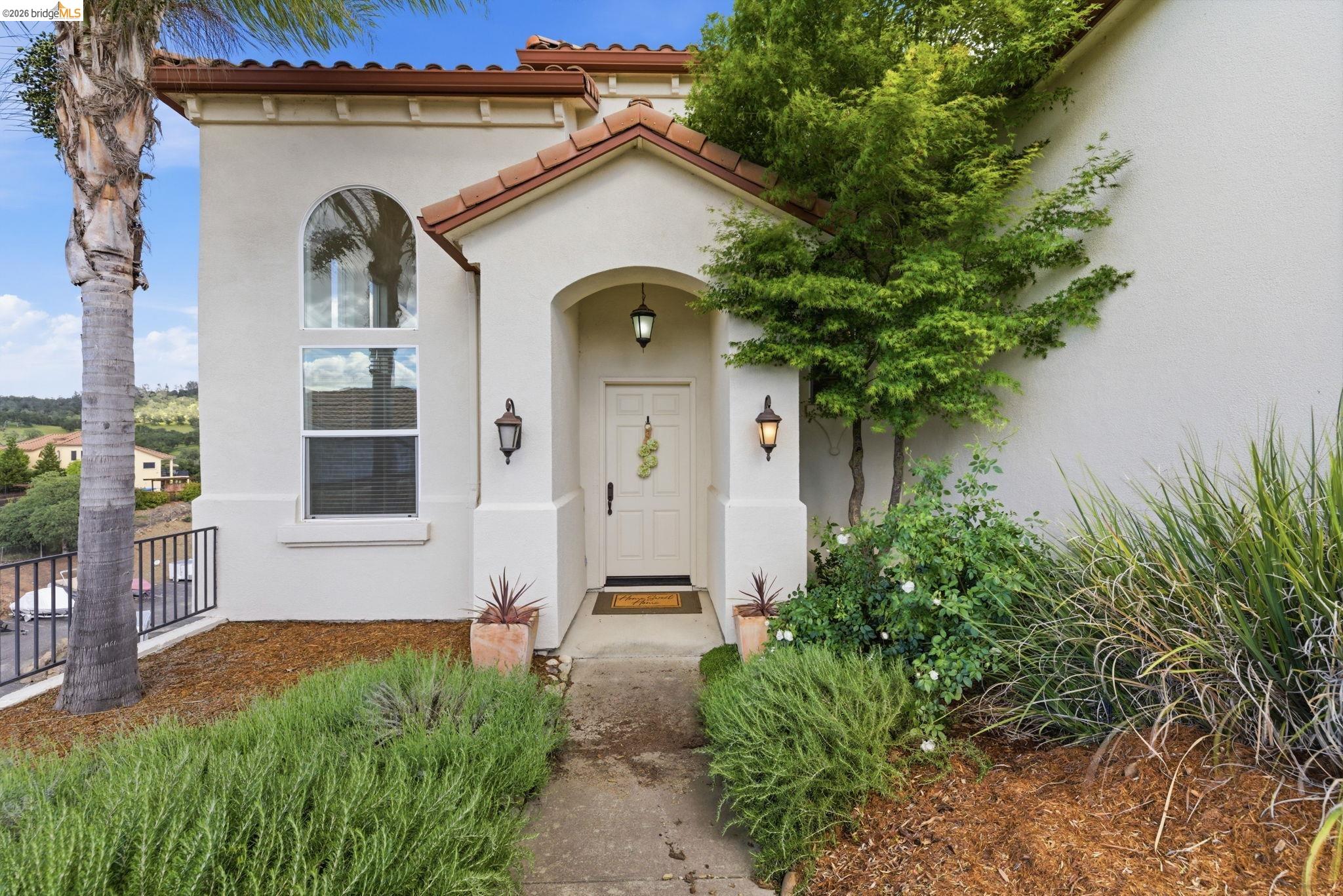 32 Apollo Lane Copperopolis, CA 95228 - Photo 3 of 58 View of front of home with stucco siding and a tile roof