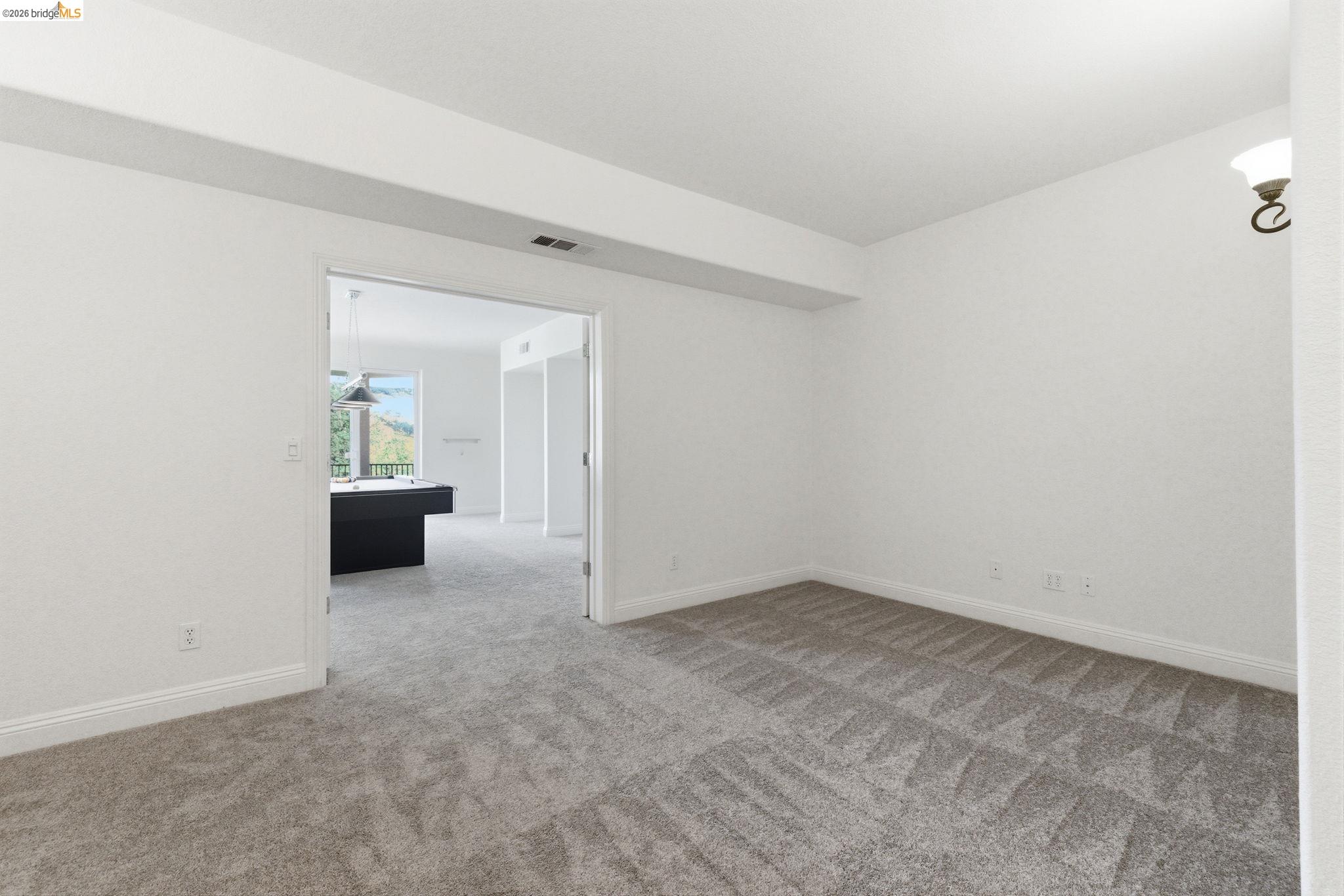 32 Apollo Lane Copperopolis, CA 95228 - Photo 37 of 58 Spare room featuring light carpet and baseboards