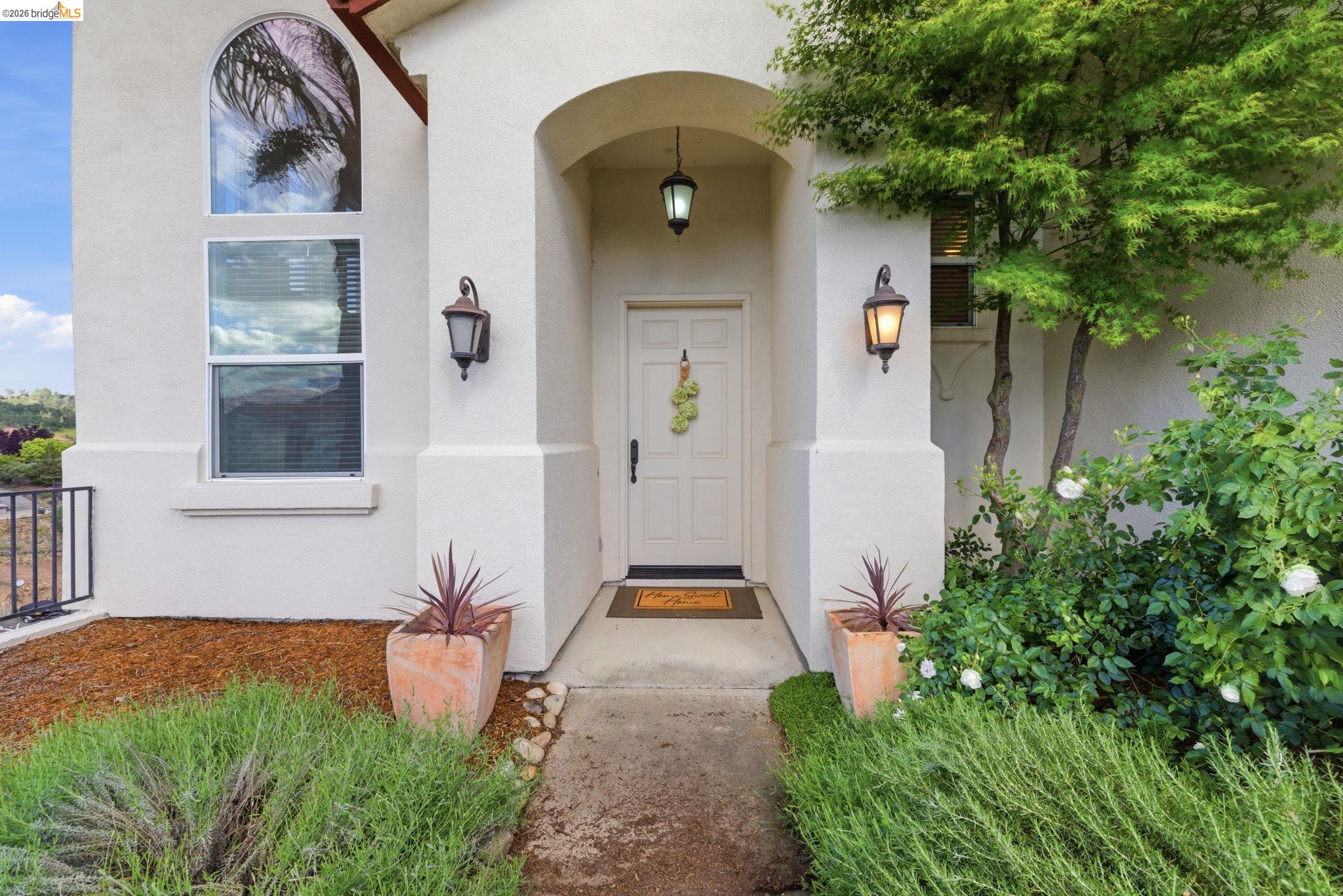 32 Apollo Lane Copperopolis, CA 95228 - Photo 46 of 58 Doorway to property featuring stucco siding