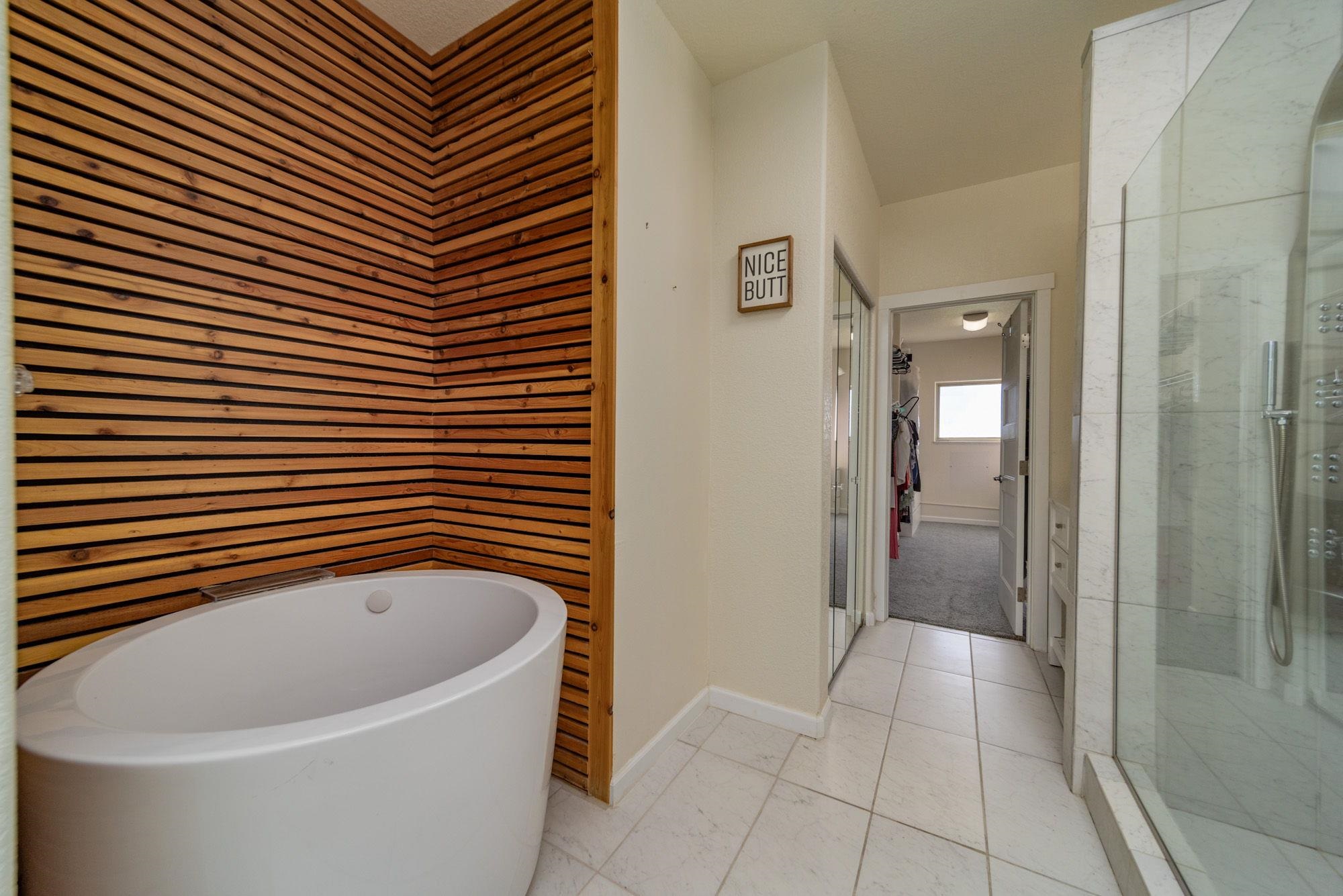 623 Sobre El Rio Drive Palisade, CO 81526 - Photo 16 of 28 a bathroom with a bathtub and shower
