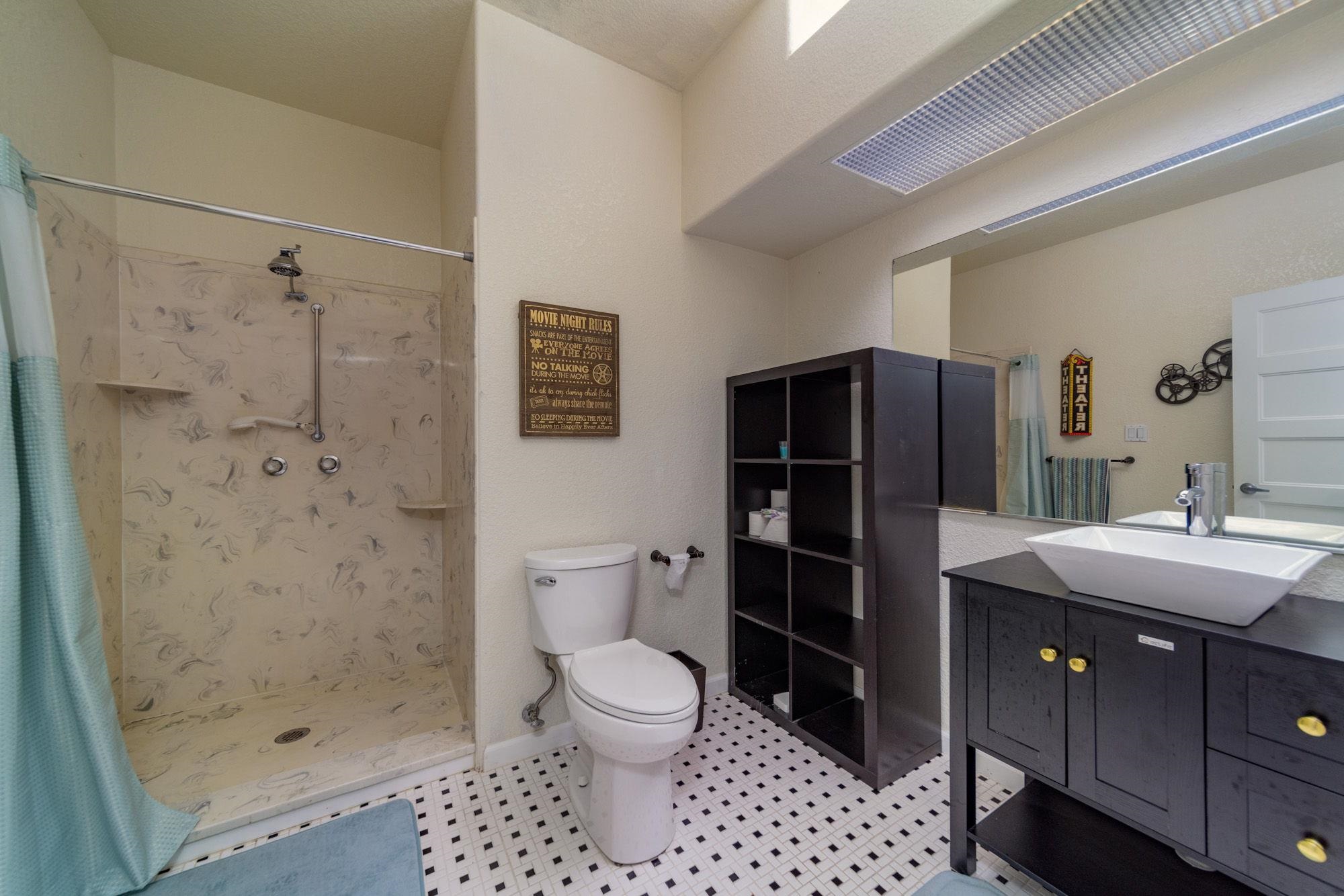 623 Sobre El Rio Drive Palisade, CO 81526 - Photo 20 of 28 a bathroom with a sink toilet and shower