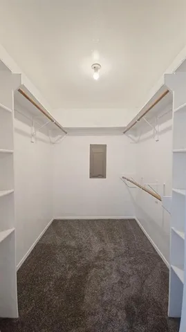 a view of a room with racks on the wall