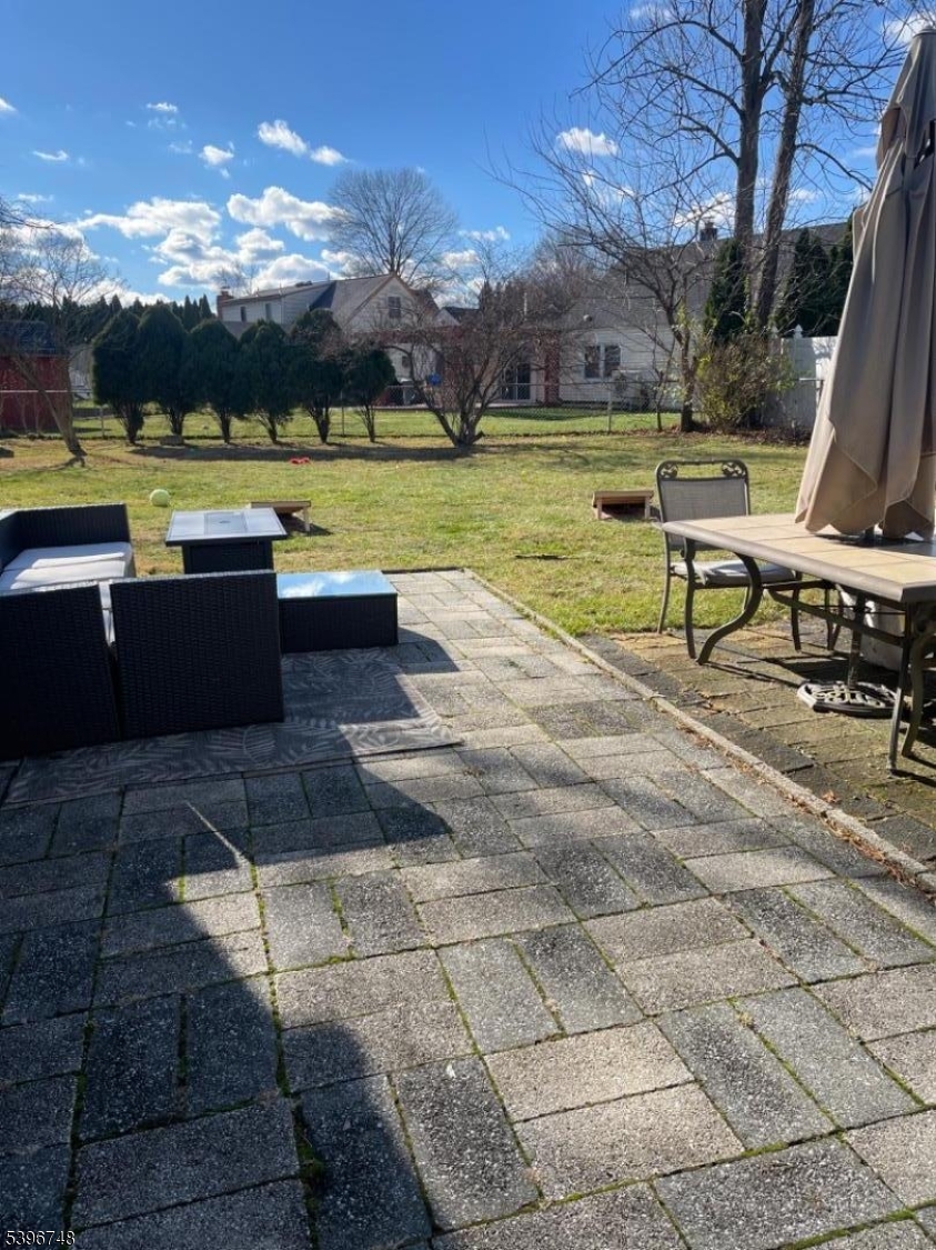 16 Brookside Avenue Pequannock, NJ 07444 - Photo 13 of 30 a view of a swimming pool with lounge chairs in the patio