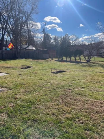 a view of a lake with a building in the background
