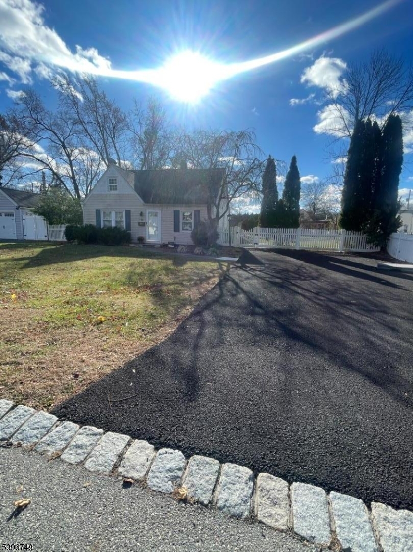 16 Brookside Avenue Pequannock, NJ 07444 - Photo 26 of 30 a view of a house with a yard