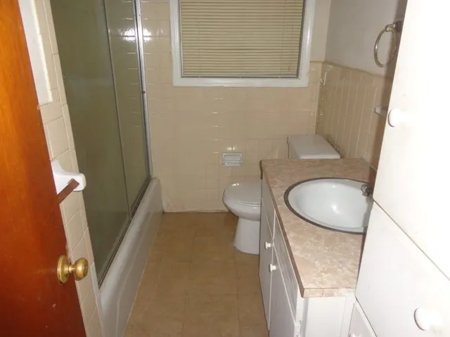 a bathroom with a sink and toilet