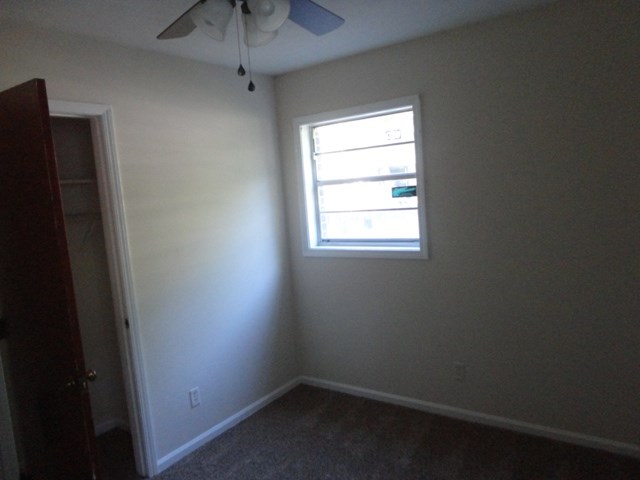 5227 Burbank Street Columbus, GA 31907 - Photo 8 of 8 an empty room with a window