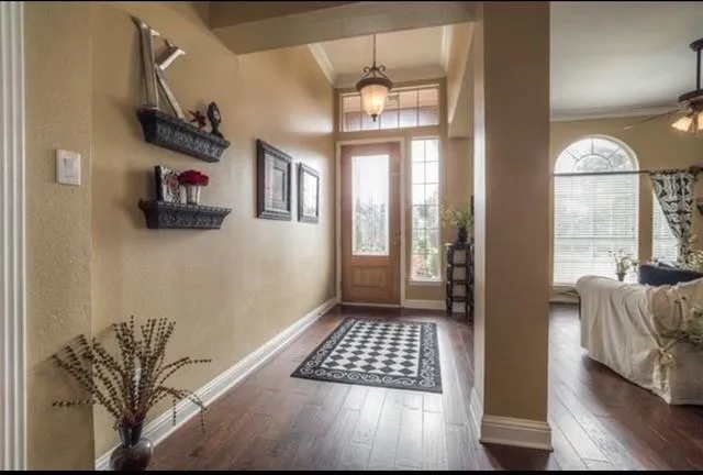 a view of livingroom with furniture and windows