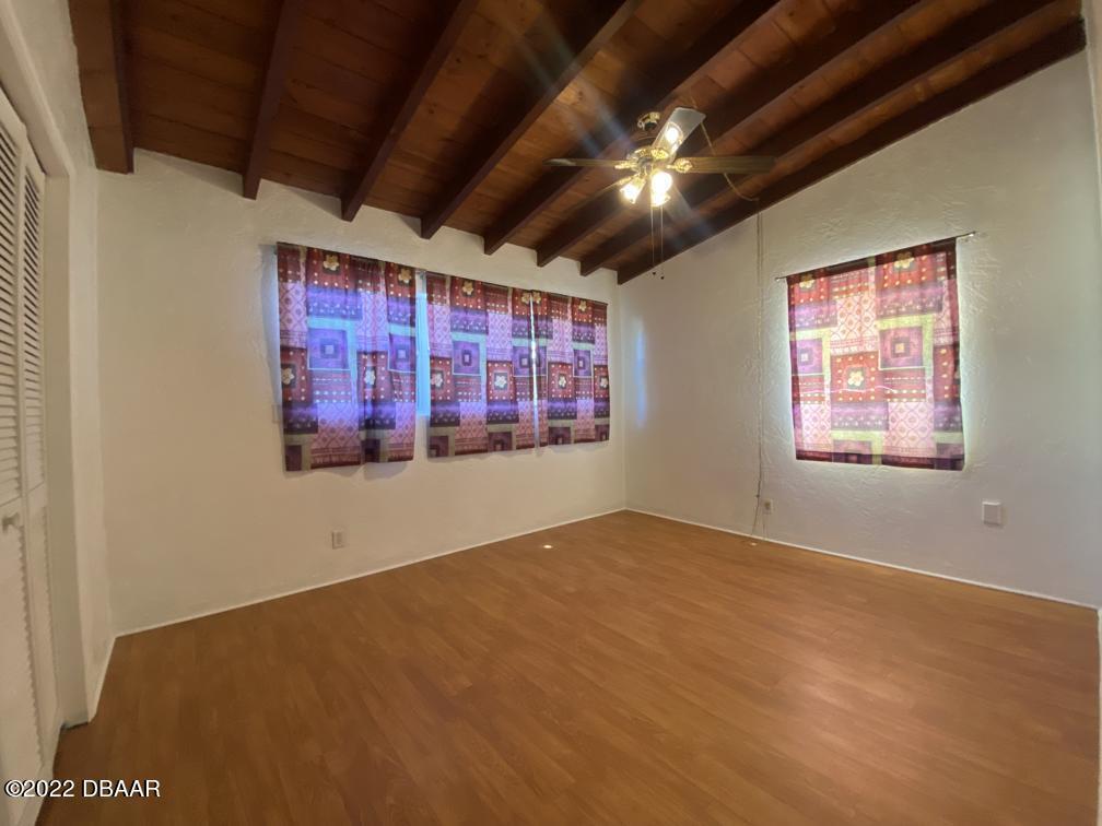 114 Essex Drive Ormond Beach, FL 32176 - Photo 13 of 21 a view of an empty room with a window