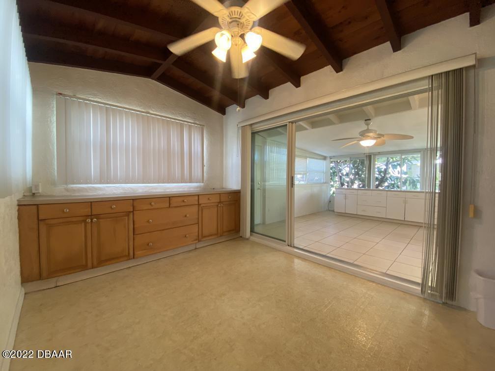114 Essex Drive Ormond Beach, FL 32176 - Photo 5 of 21 a view of an empty room with a window