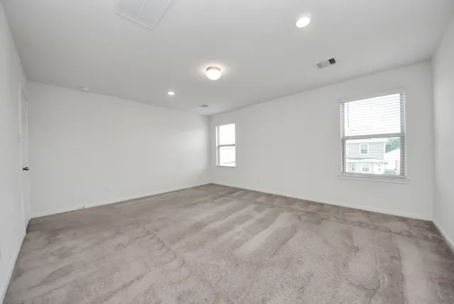 a bathroom with a sink vanity and mirror