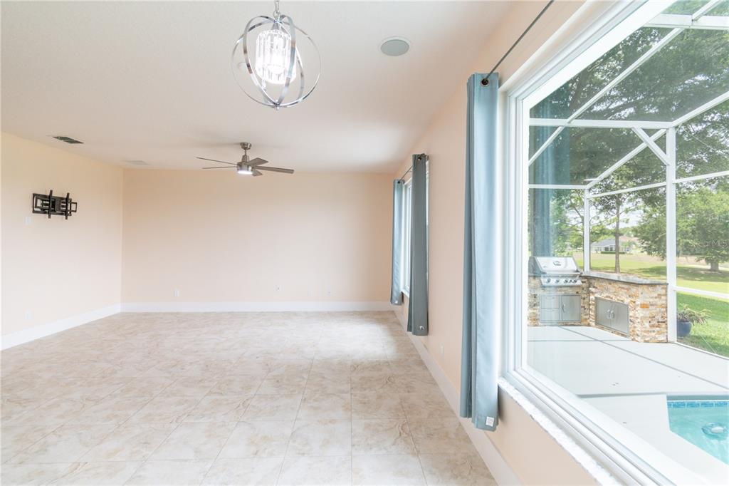 3862 Beacon Ridge Way Clermont, FL 34711 - Photo 24 of 56 a view of an empty room with a window