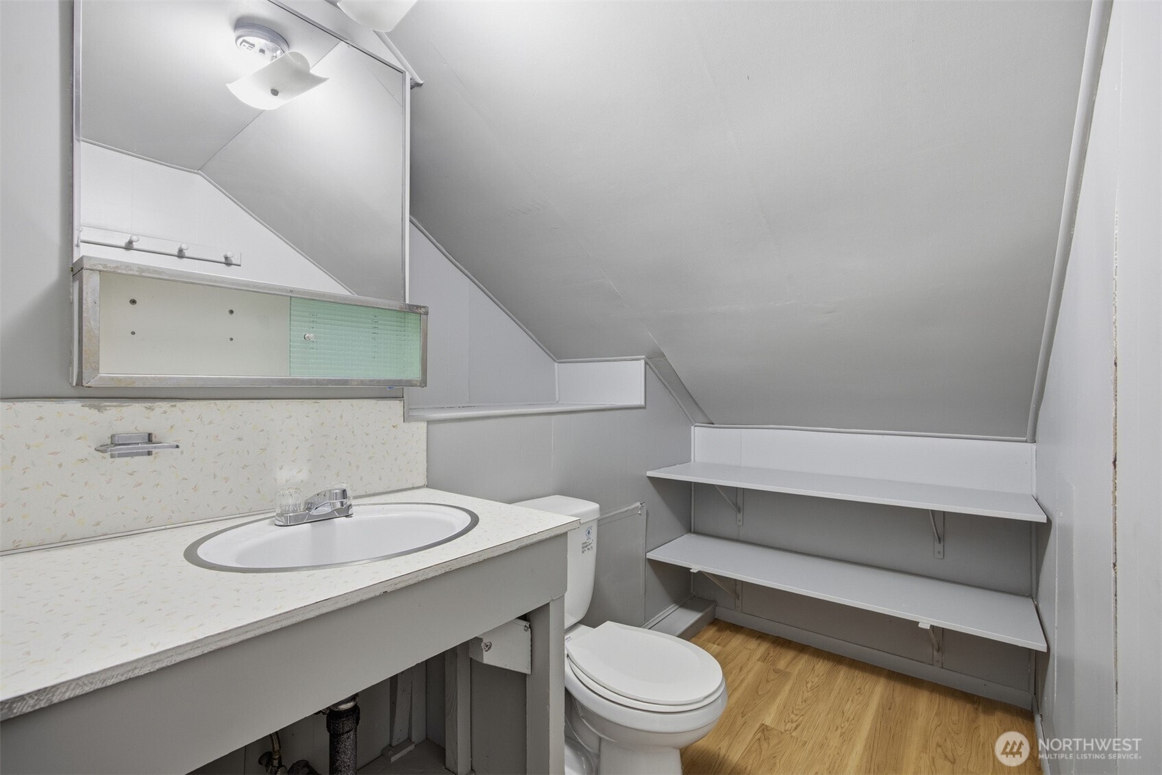 6791 Noon Road Everson, WA 98247 - Photo 25 of 38 a bathroom with a sink a toilet and mirror
