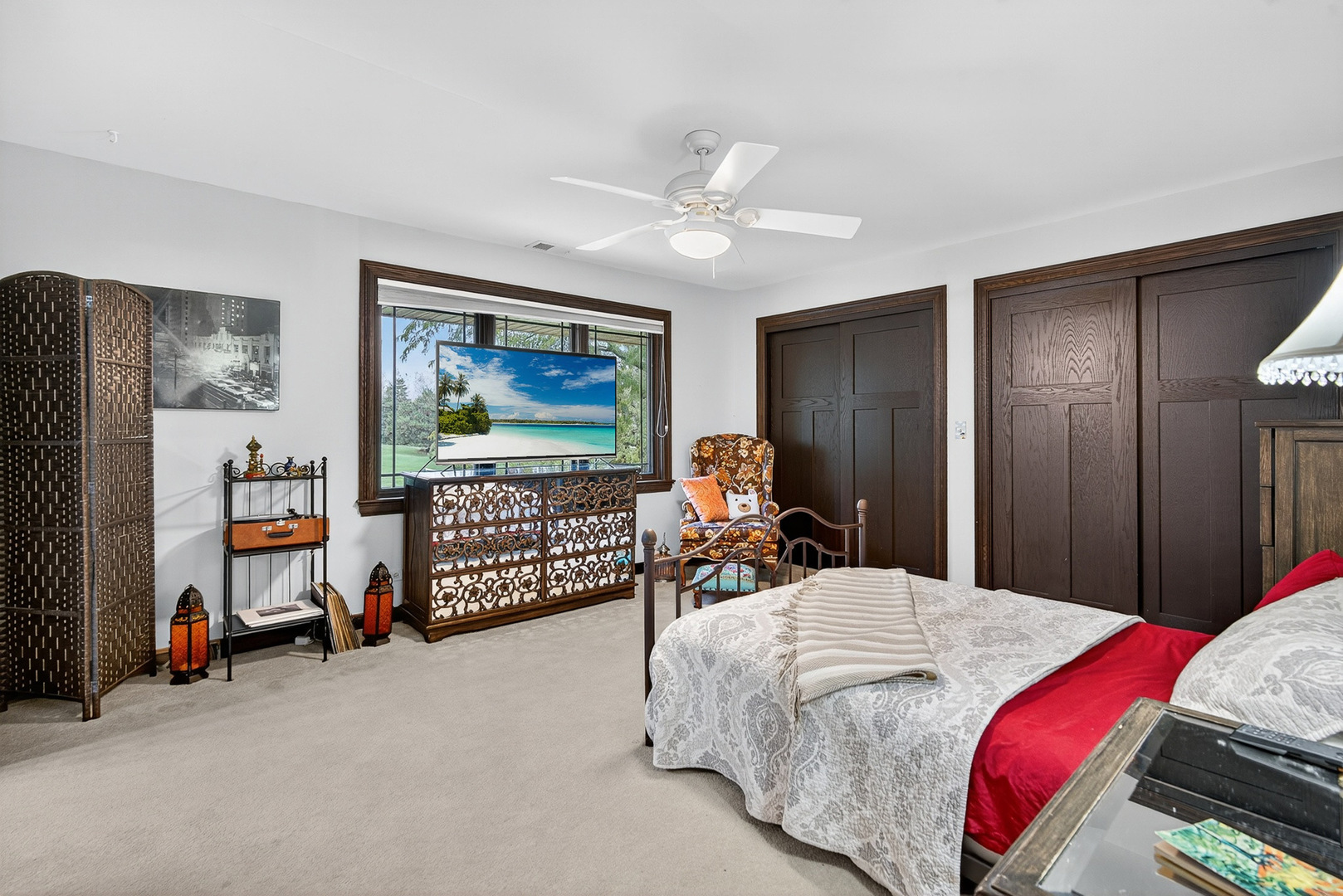 1886 West Clover Drive Inverness, IL 60067 - Photo 28 of 45 a bedroom with a bed and a chandelier