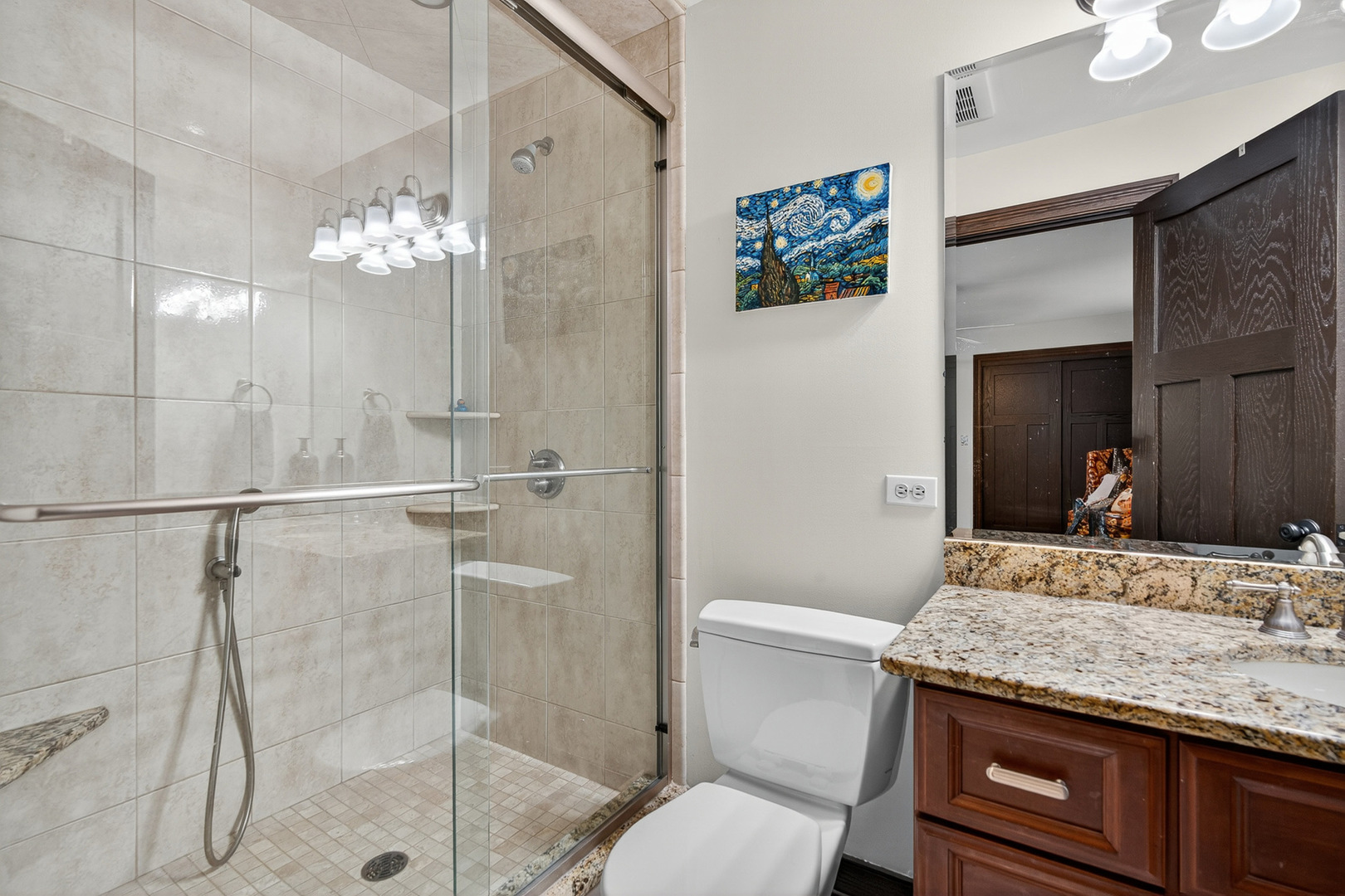 1886 West Clover Drive Inverness, IL 60067 - Photo 29 of 45 a bathroom with a granite countertop sink toilet a mirror and shower