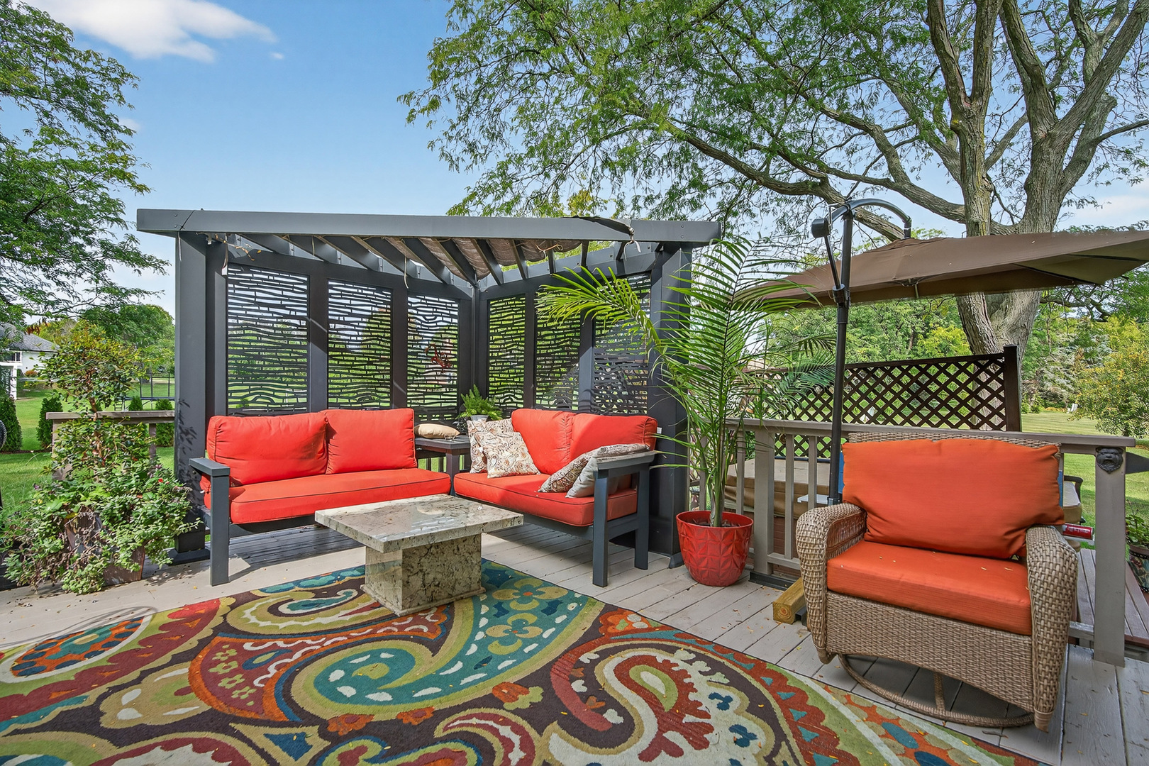 1886 West Clover Drive Inverness, IL 60067 - Photo 37 of 45 an outdoor sitting area with furniture and wooden floor