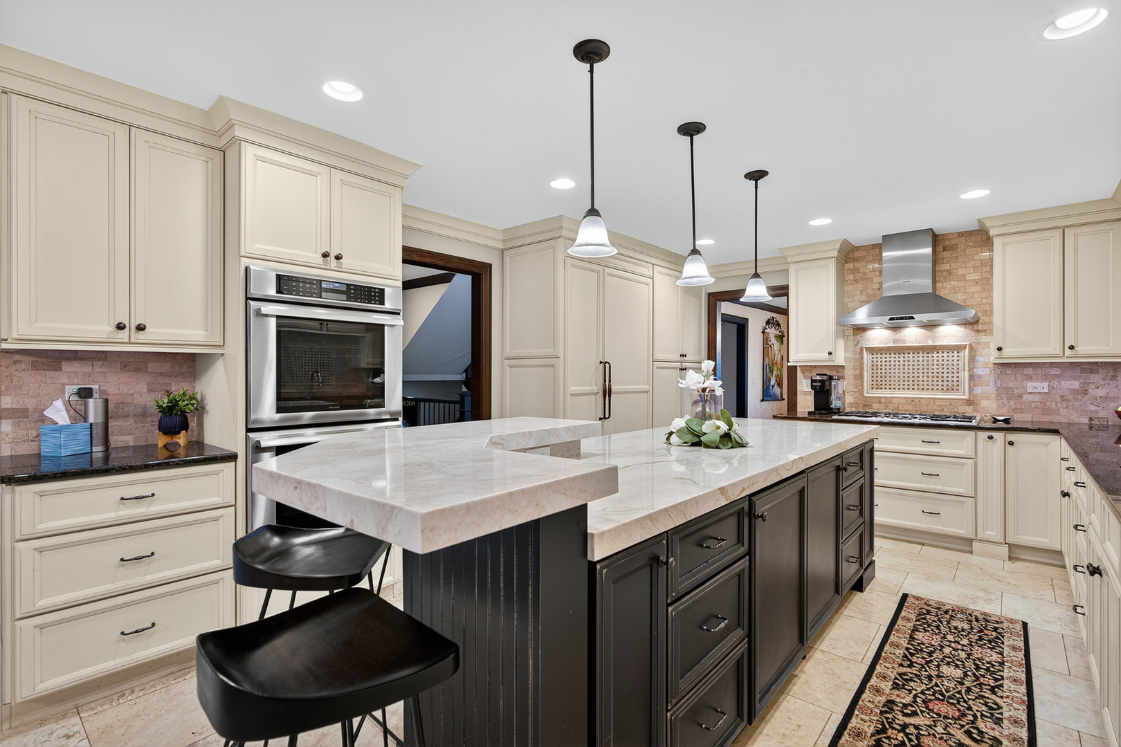 1886 West Clover Drive Inverness, IL 60067 - Photo 7 of 45 a kitchen with a sink stainless steel appliances and cabinets