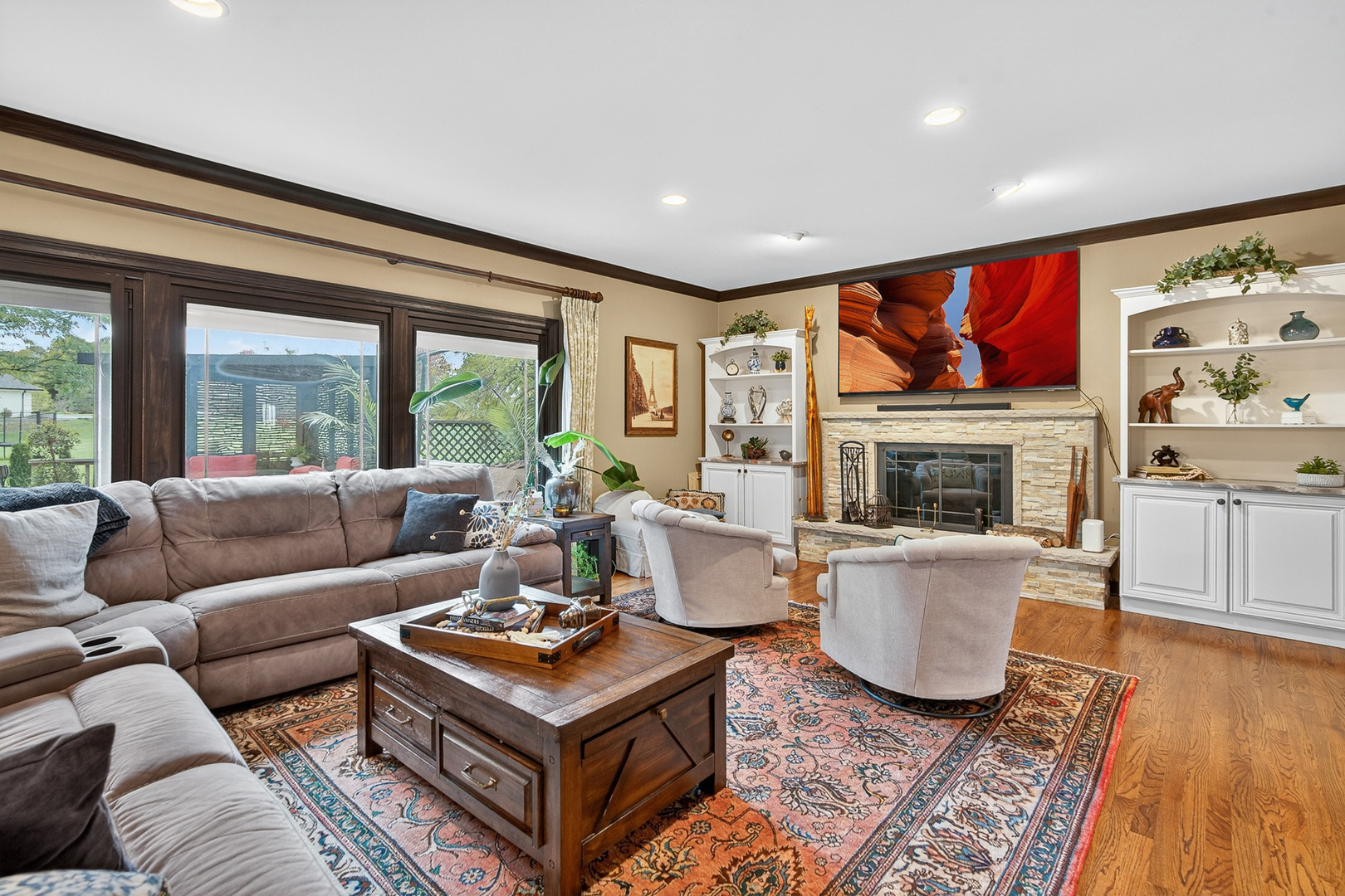 1886 West Clover Drive Inverness, IL 60067 - Photo 10 of 45 a living room with furniture a fireplace and a large window