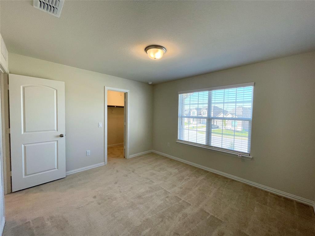1805 Nelson Street Anna, TX 75409 - Photo 33 of 38 a view of an empty room with a window