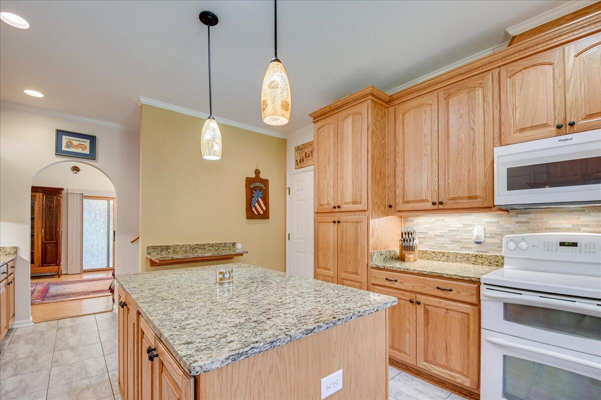 2008 Gregory Lake Road North Augusta, SC 29860 - Photo 12 of 56 Completely remodled- beautiful backsplash, under counter lighting, all drawers have organizers, shelves in cabinets have pull outs, spice rack, utility pantry, and lazy Susan in corner cabinets.