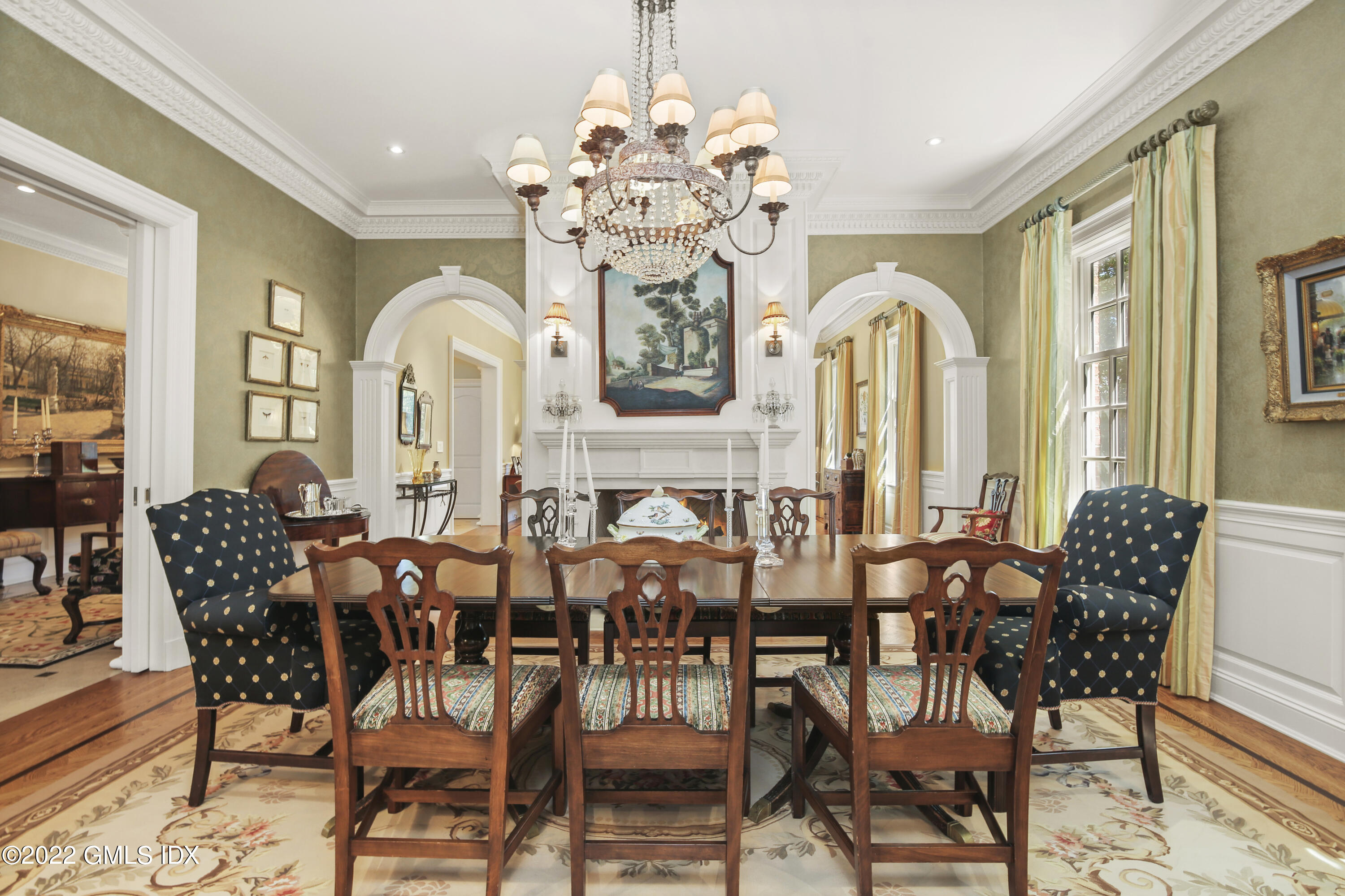 62 Ridge Street Greenwich, CT 06830 - Photo 8 of 40 a view of a dining room with furniture and chandelier