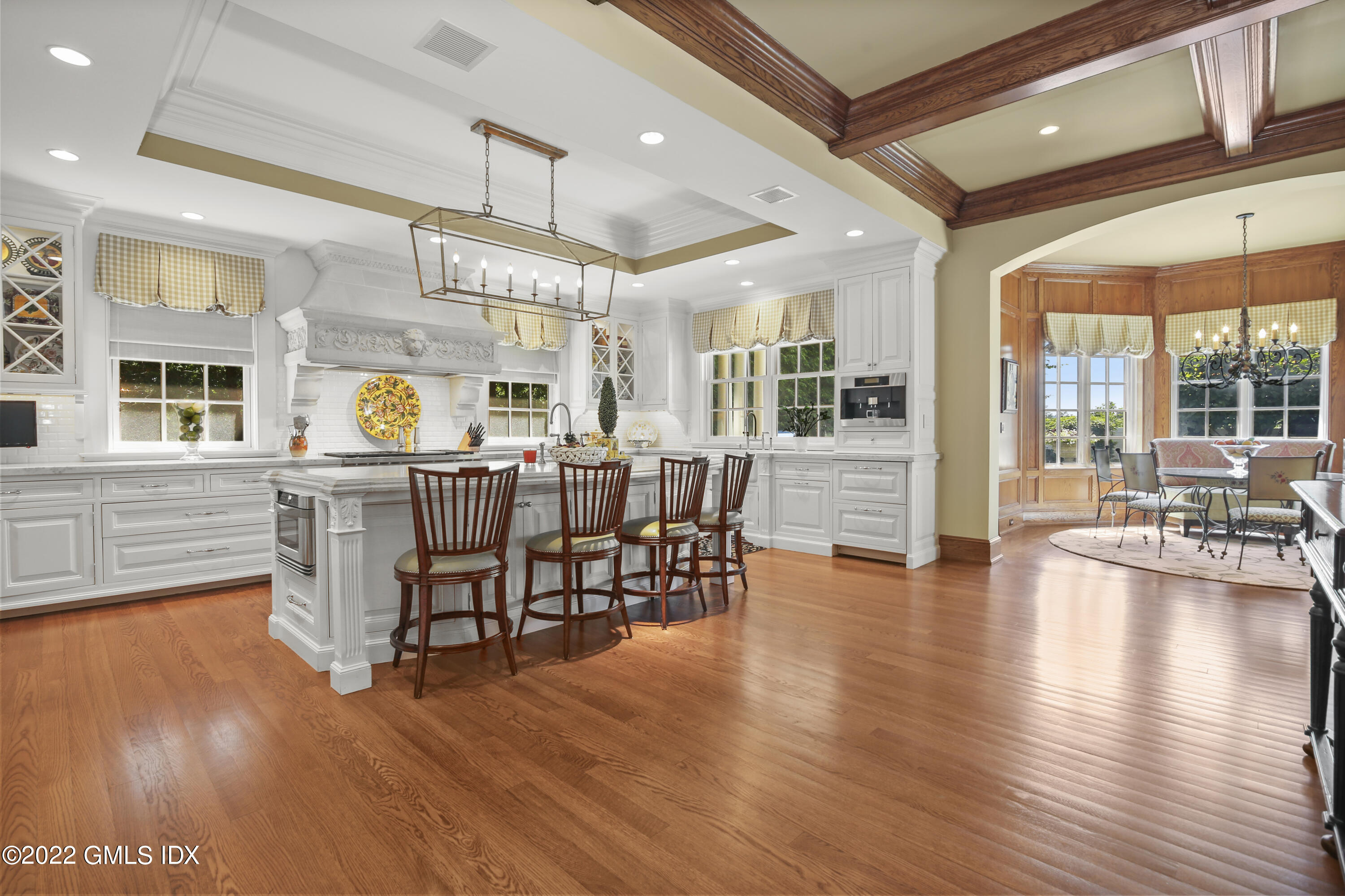 62 Ridge Street Greenwich, CT 06830 - Photo 10 of 40 a view of a dining room with furniture window and wooden floor