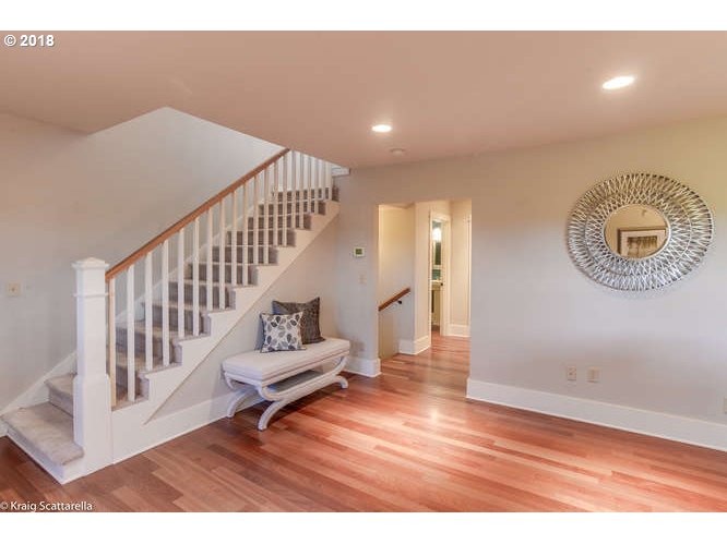 9506 Southwest Boones Ferry Road Portland, OR 97219 - Photo 14 of 32 a view of an entryway with wooden floor