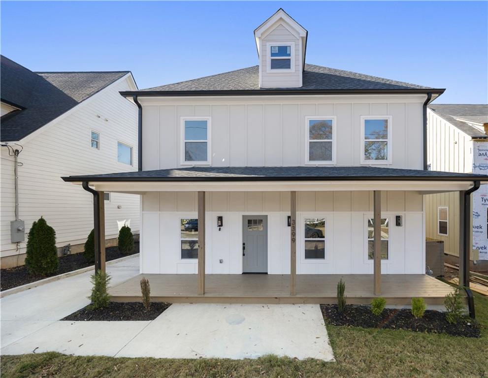 3399 Lee Street Atlanta, GA 30344 - Photo 1 of 1 a front view of a house with garage