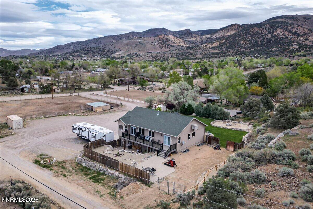 15770 Rocky Vista Road Reno, NV 89521 - Photo 58 of 68 an aerial view of a house with a mountain
