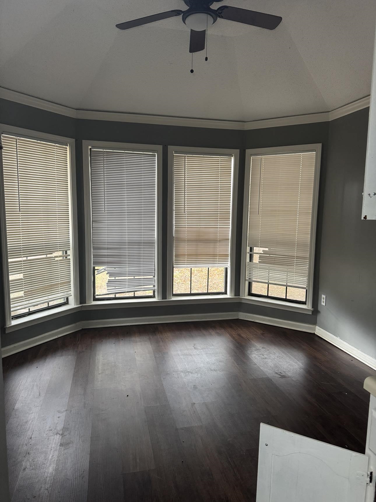2744 Arbor Ln Drive Memphis, TN 38133 - Photo 11 of 11 a view of an empty room with wooden floor and a window