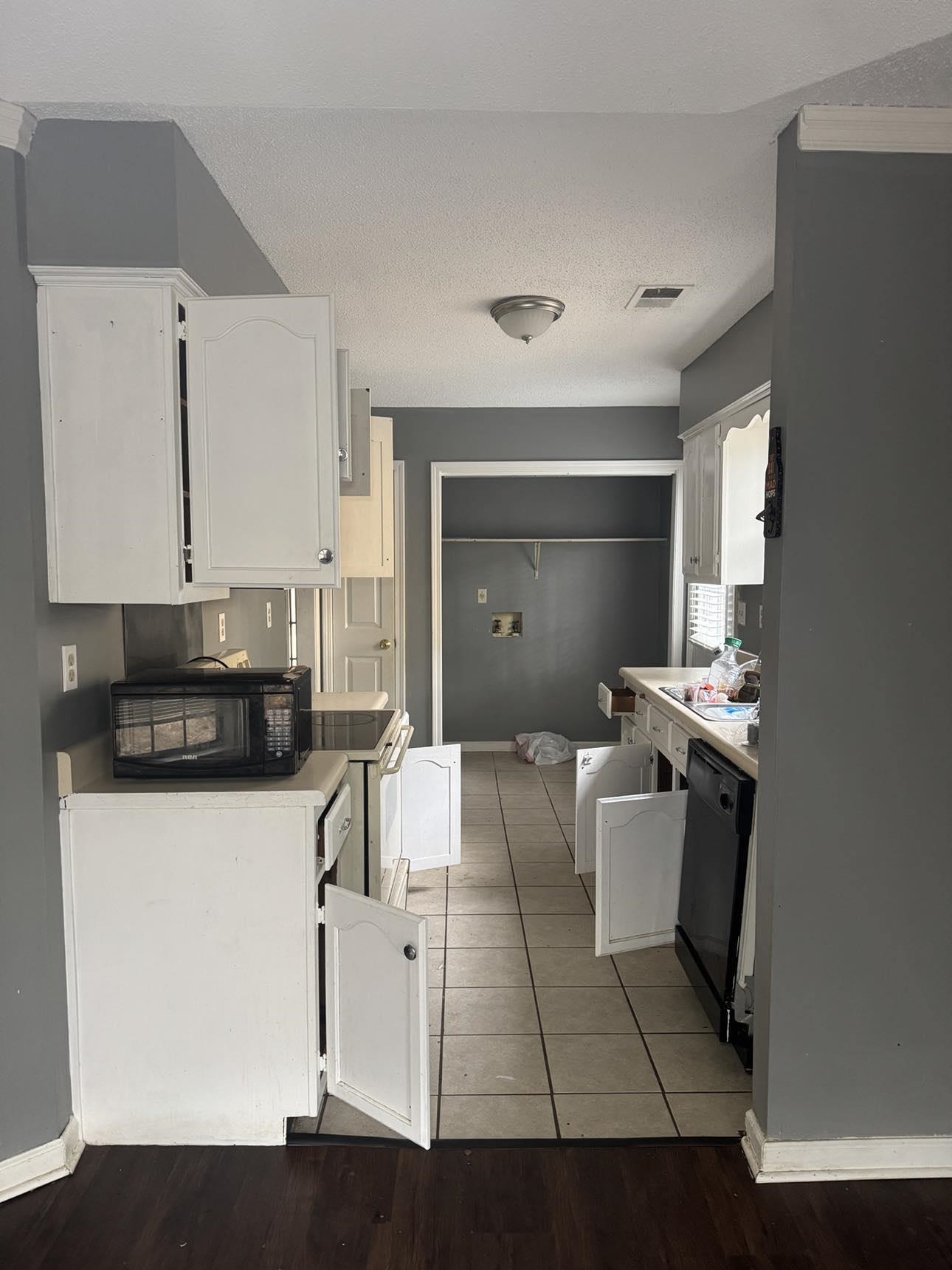 2744 Arbor Ln Drive Memphis, TN 38133 - Photo 5 of 11 a kitchen with a sink appliances and cabinets