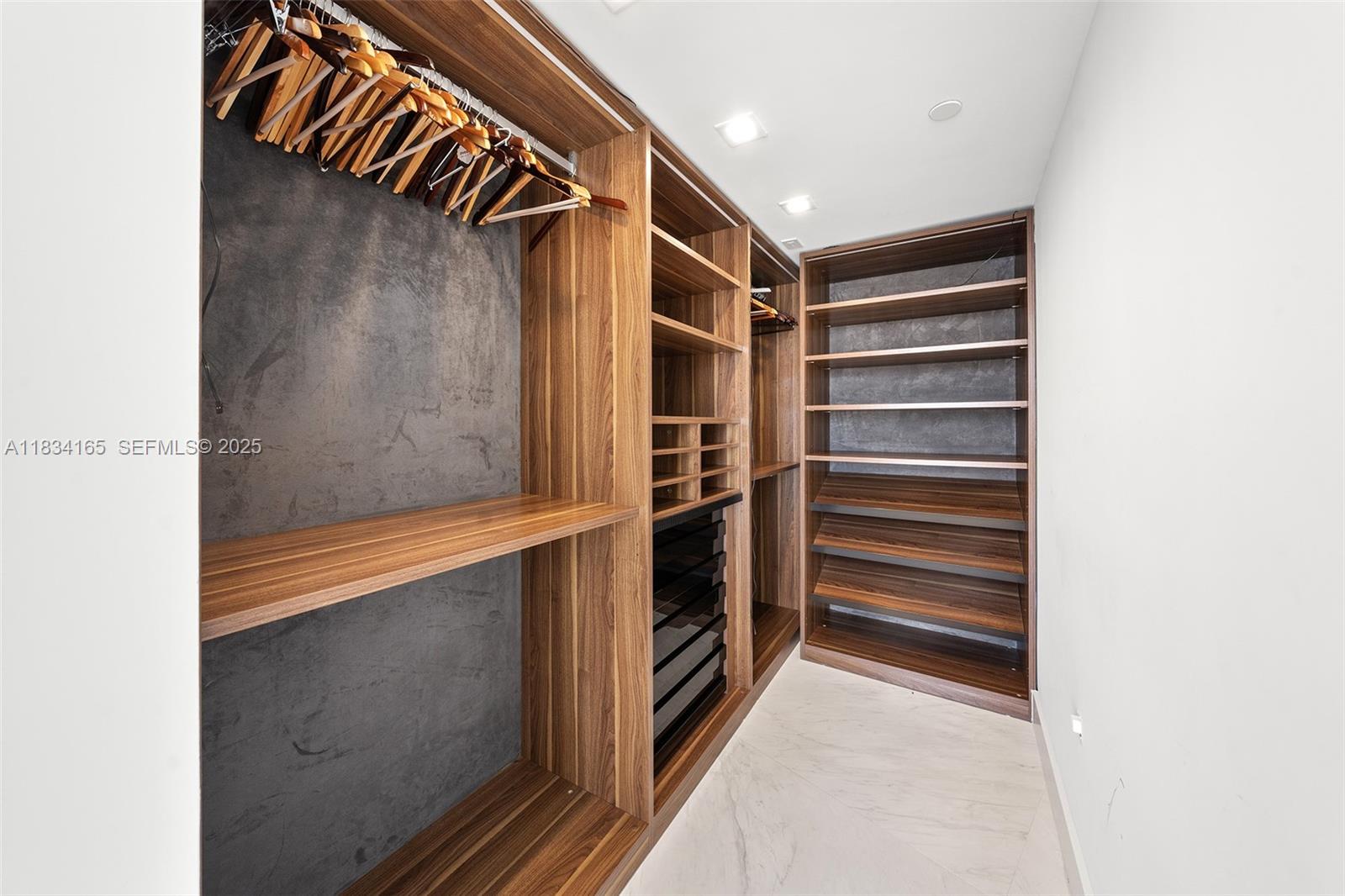 450 Alton Road, Unit 901902 Miami Beach, FL 33139 - Photo 59 of 100 a view of walk in closet