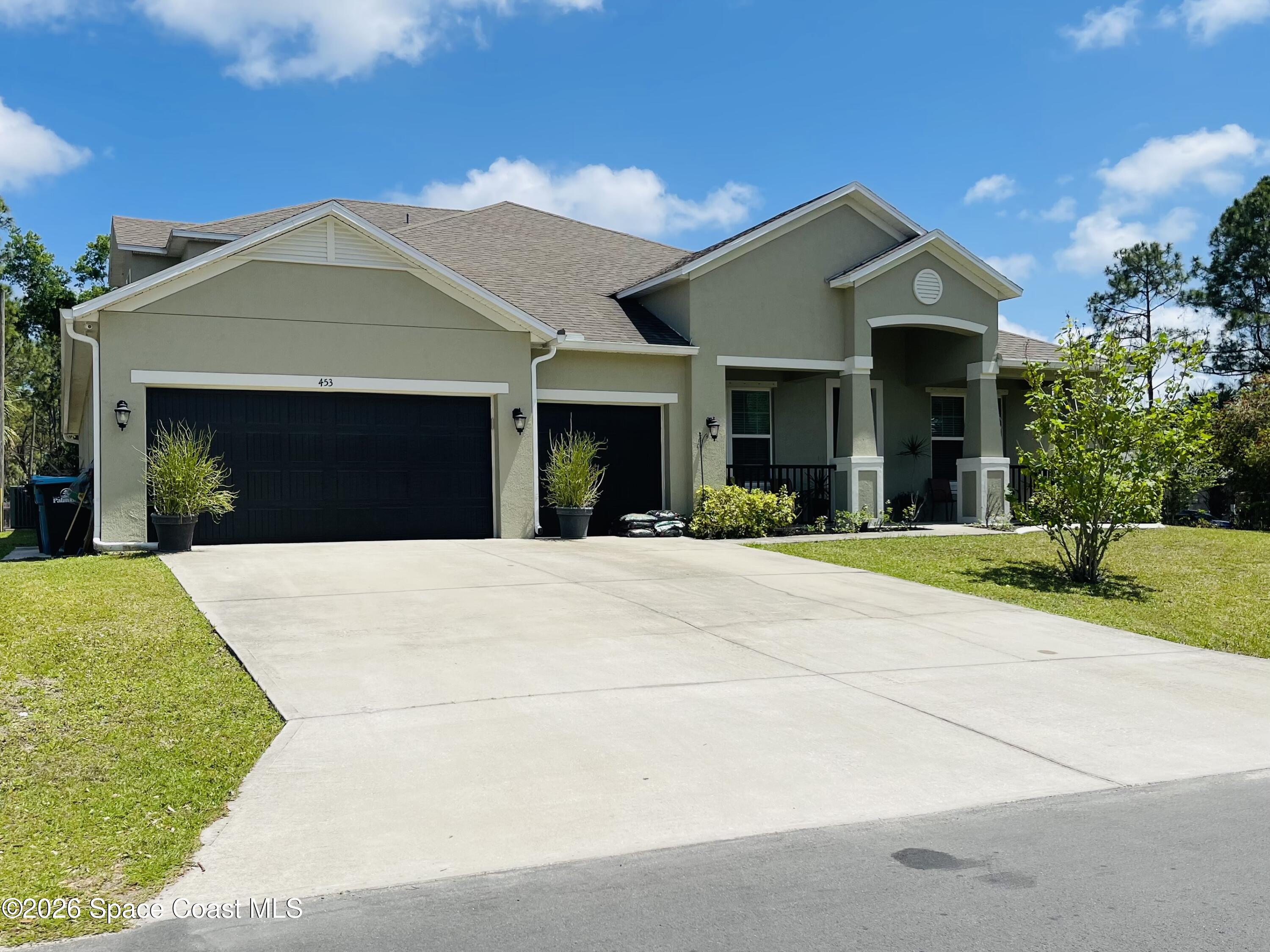 453 Danis Road Southwest Palm Bay, FL 32908 - Photo 8 of 11 3 car Garage