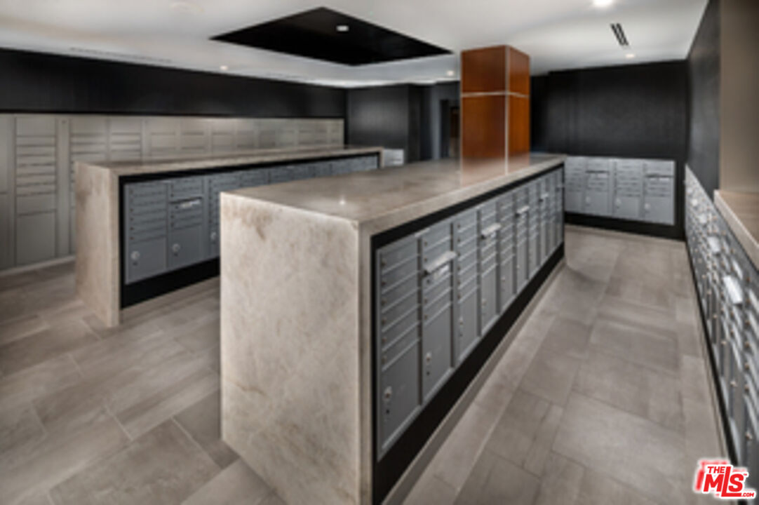 687 South Hobart Boulevard, Unit 327 Los Angeles, CA 90005 - Photo 2 of 21 a kitchen with lots of counter top space