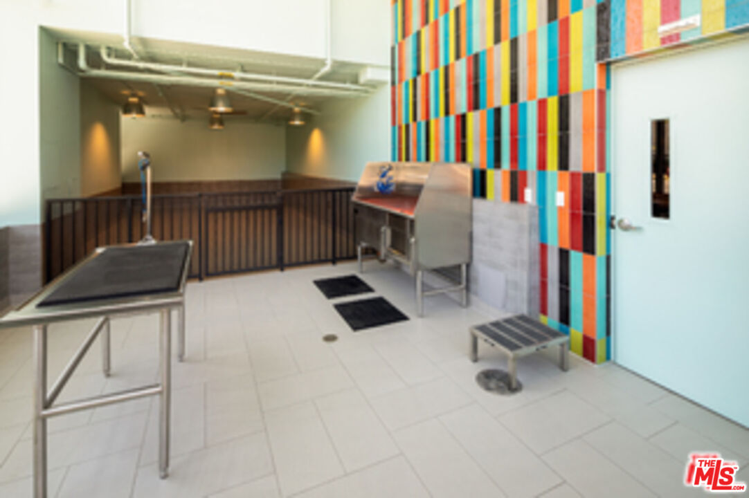 687 South Hobart Boulevard, Unit 327 Los Angeles, CA 90005 - Photo 3 of 21 view of hall way with furniture