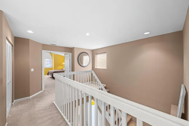 a view of a hallway with front door