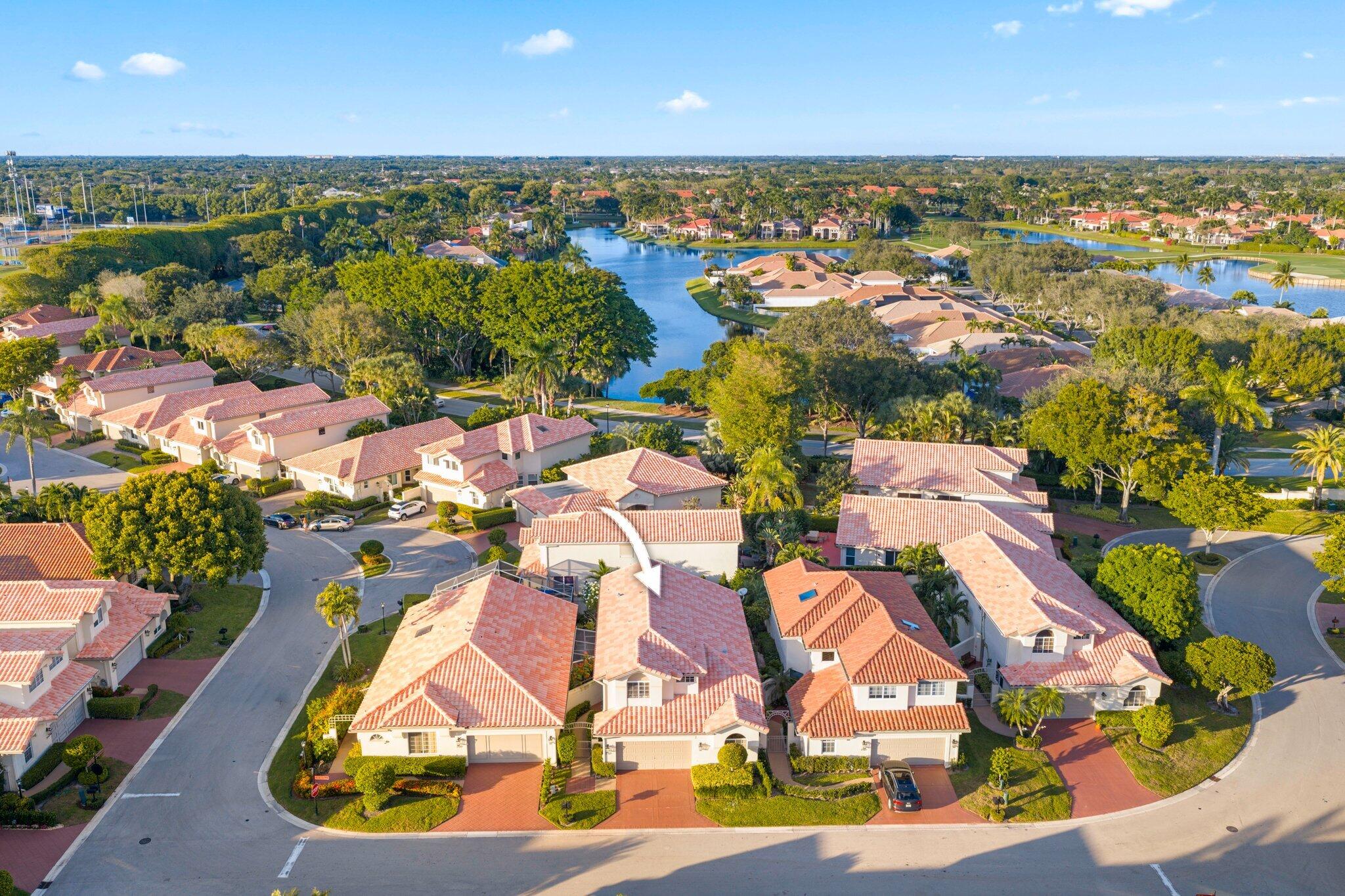 2595 Northwest 53rd Street Boca Raton, FL 33496 - Photo 25 of 48 an aerial view of residential houses with outdoor space