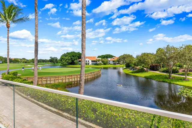 a view of a lake with a big yard