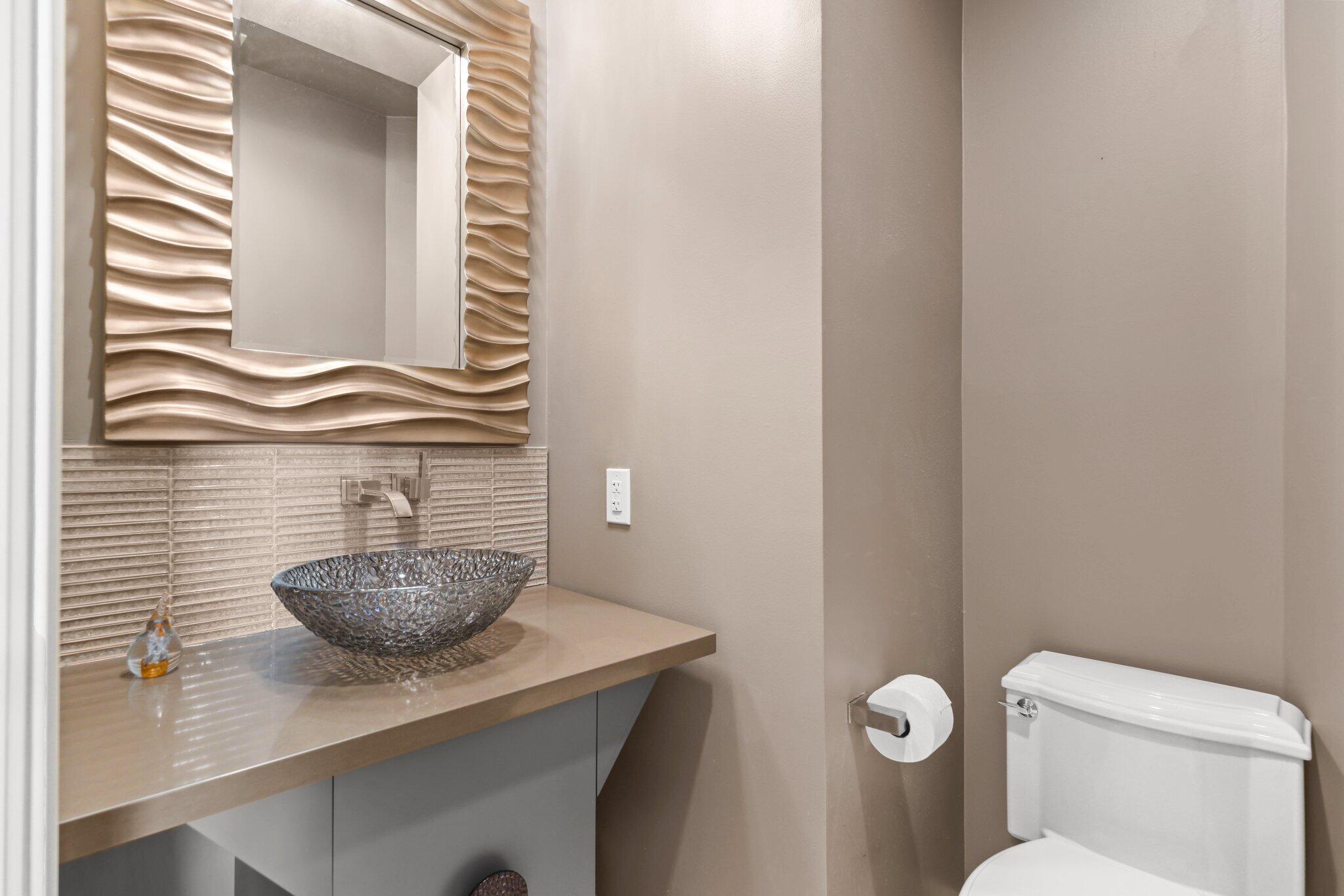 2595 Northwest 53rd Street Boca Raton, FL 33496 - Photo 9 of 48 a bathroom with a toilet and a sink